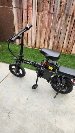 black foldable electric bike appears to be a 14-inch model