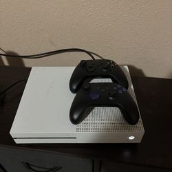 Read description (Xbox one s. two blacked out controllers included)
