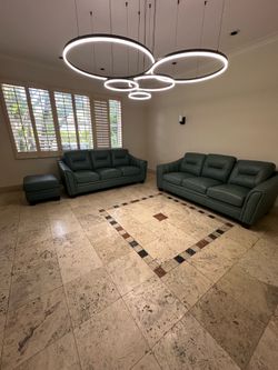 2-piece Premium leather sofa and ottoman in great condition