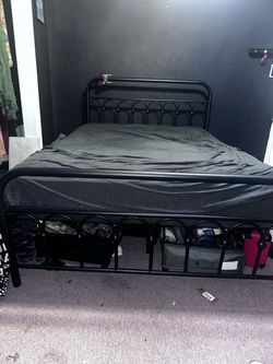 Black metal bed frame (full sized)
