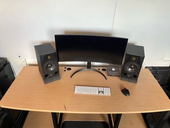 Audio Desk mounted on 8 caster, 2 lockable. 12 U Rack space either side