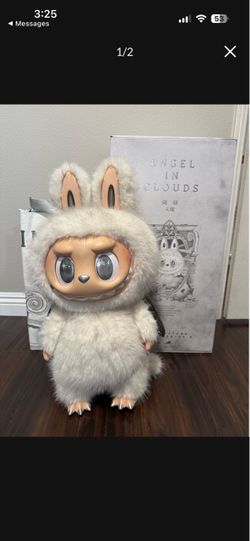 Zimomo Angel in the clouds