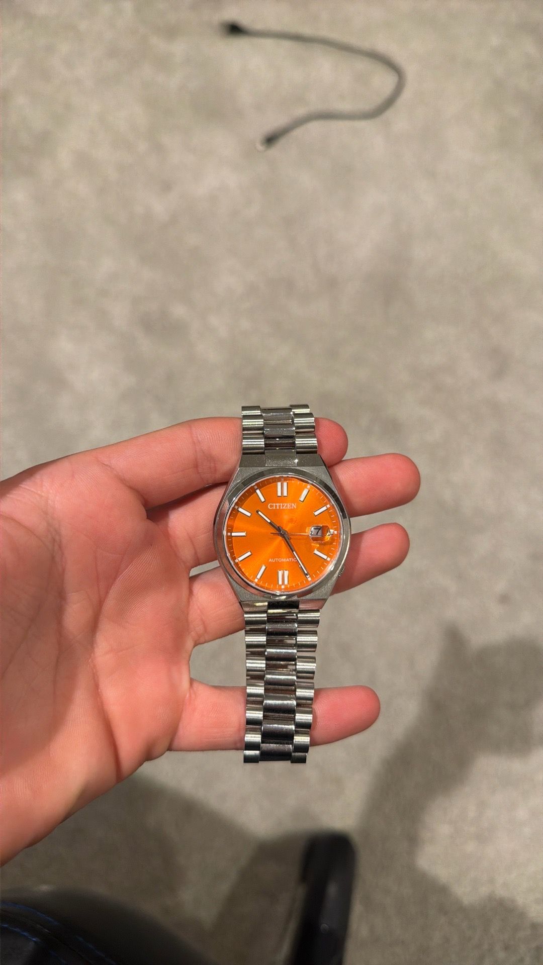 Orange citizen watch