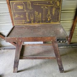 Antique wooden kid's workbench With a pegboard back Classic Vintage Tool Tools Vise