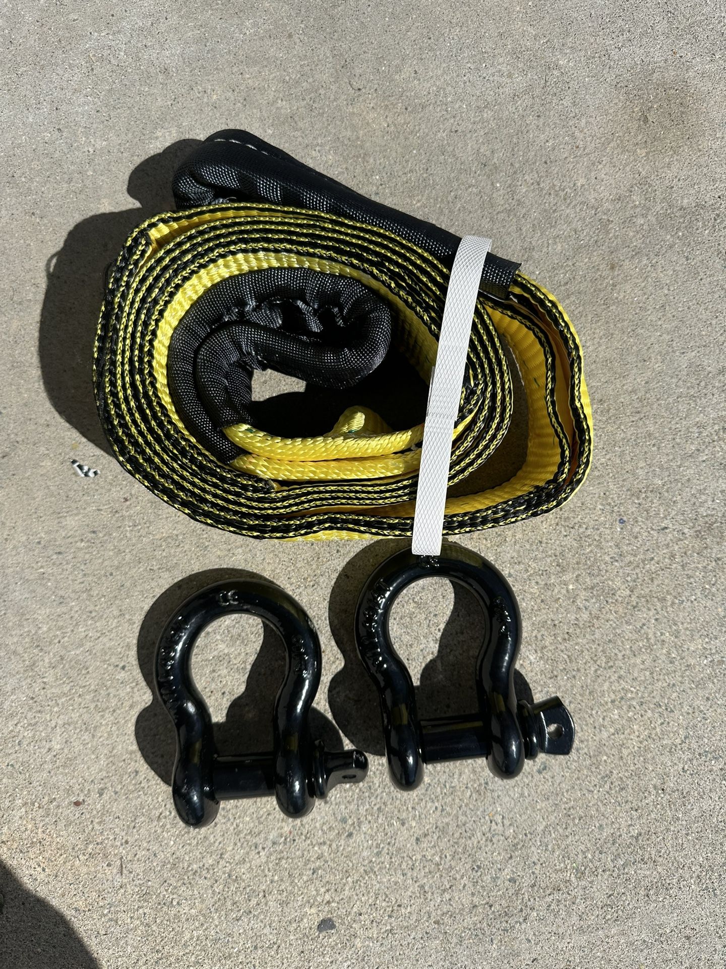 winch recovery kit, which includes a tree saver strap and two D-ring shackles