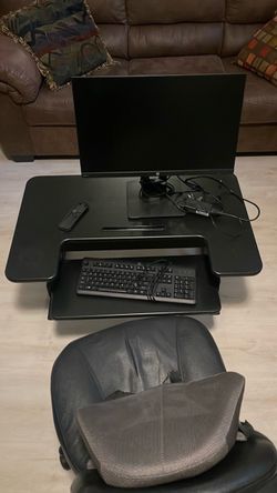 Adjustable table riser converter with monitor and chair