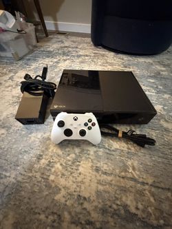 Microsoft Black Xbox One Original With Brand New White Controller Brand New HDMI Cord With A Power Bank