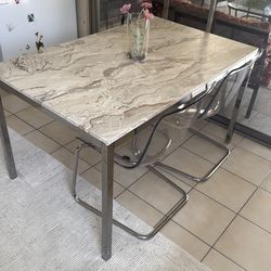 IKEA Kitchen table with 2 ghost chairs
