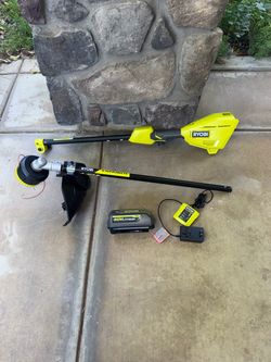 RYOBI 40V 15 in. Expand-It Attachment Capable String Trimmer with 4.0 Ah Battery + Charger
