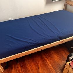 Twin mattress and wooden bed frame 150 or obo
