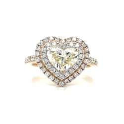 Designs 18K Double Halo Diamond Ring 💍❤️ 18K yellow gold diamond ring. The center is set with a 1.23 carat heart shaped diamond, which has a clarity 