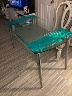 Glass kitchen table with shelf underneath