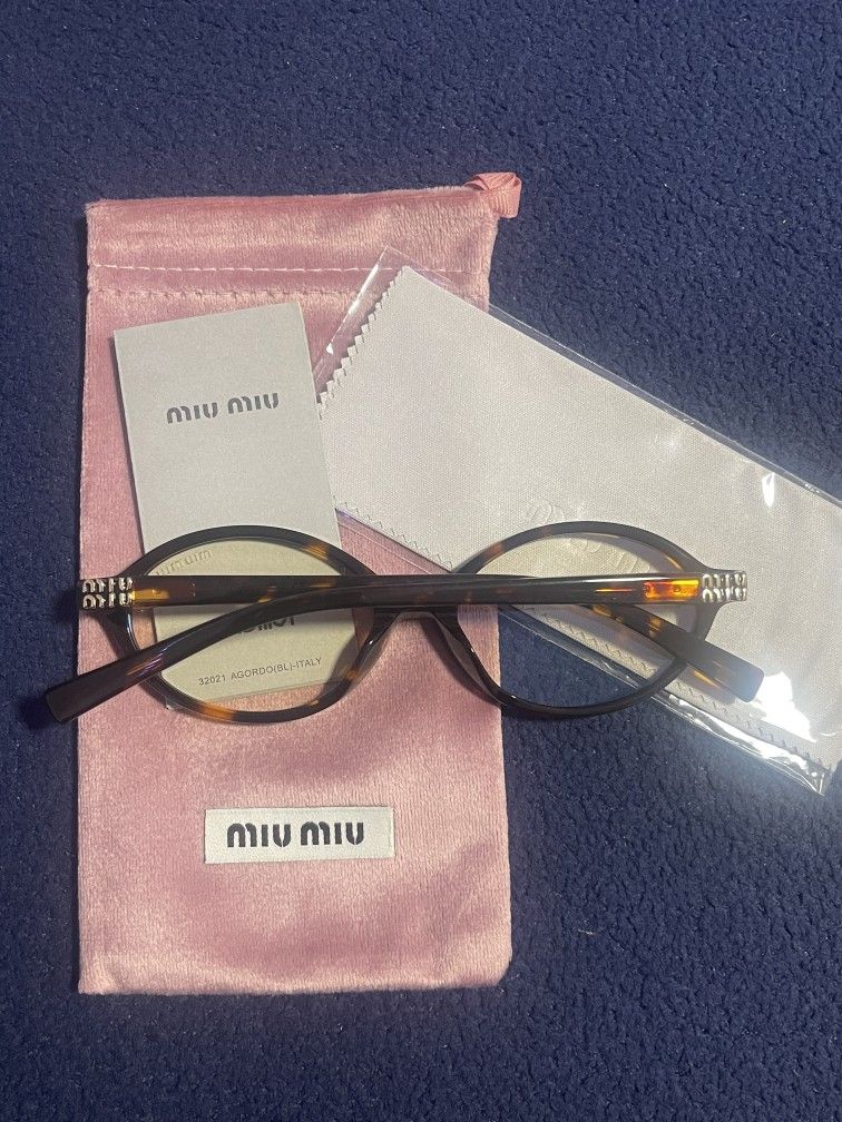 Miu Miu glasses 
