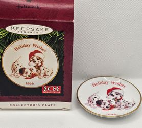 New Hallmark ornament Holiday Wishes 101 Dalmation 1996 Plate dog cartoon Disney 

Brand new, in box. Comes with the display stand.
The Hallmark Keeps