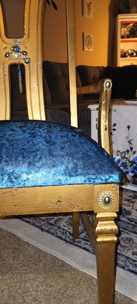 One Of  A Kind Chair.  A Shiny Matt Gold With Soft Blue Cushion.