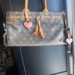 vintage Dooney & Bourke rainbow monogram satchel with brown leather handles