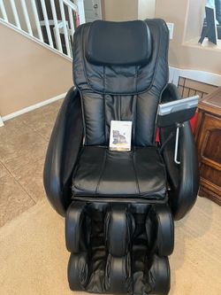 Massage chair by Cozzia