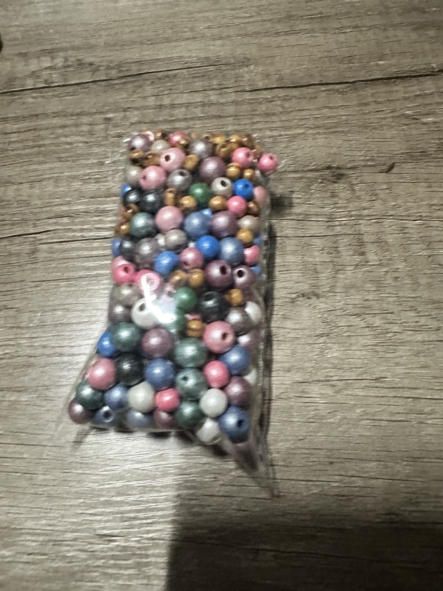 Round world, wood, pearl like beads