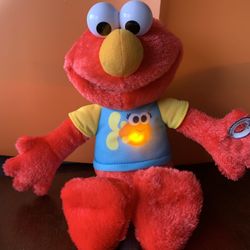 Elmo Singing And Chest Lights Up