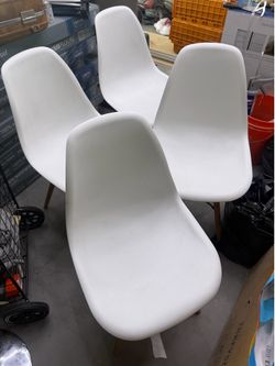 4 white industrial chairs