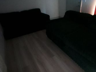 Black furry couches