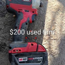 Two (2) Milwaukee Impact Drill & Battery Sets