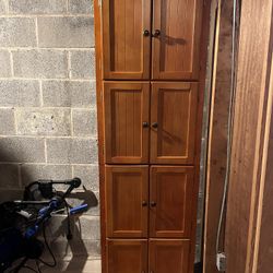 8 Door Wall Cabinet 23.75” W X72” h x 12” d;