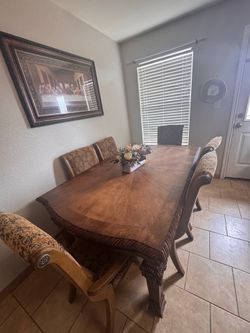 Antique dining table with 6 chairs