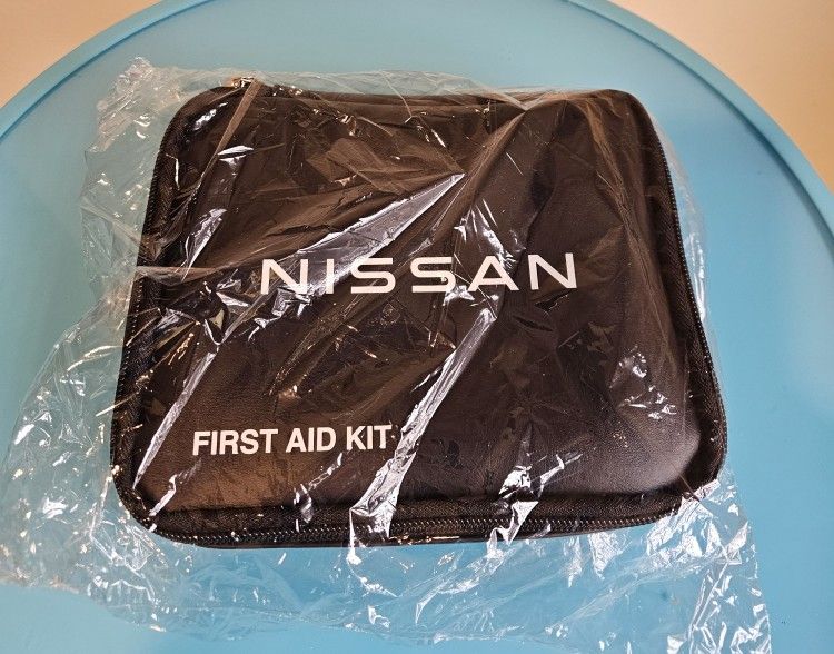 BRAND NEW OEM SEALED 2015 - 2023 NISSAN FIRST AID KIT IN SEALED NISSAN PACKAGING