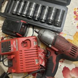 Used 1/2inch Milwaukee Impact Wrench,Battery Charger & Duralast Sockets 