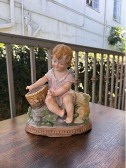 Antique porcelain blonde child with two baskets