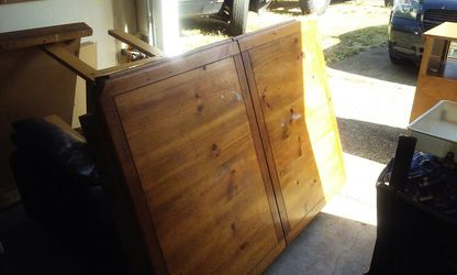 Solid wood table with leaf. No chairs