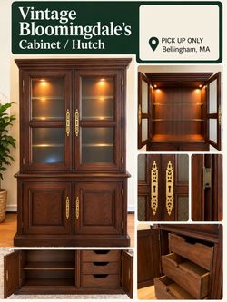 Beautiful and sturdy vintage cabinet from Bloomingdale’s, made of solid ash wood with elegant details and a classic design.