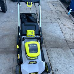 Lawnmower Ryobi push croos cut  come w 1fast charger and 6ah battt new 