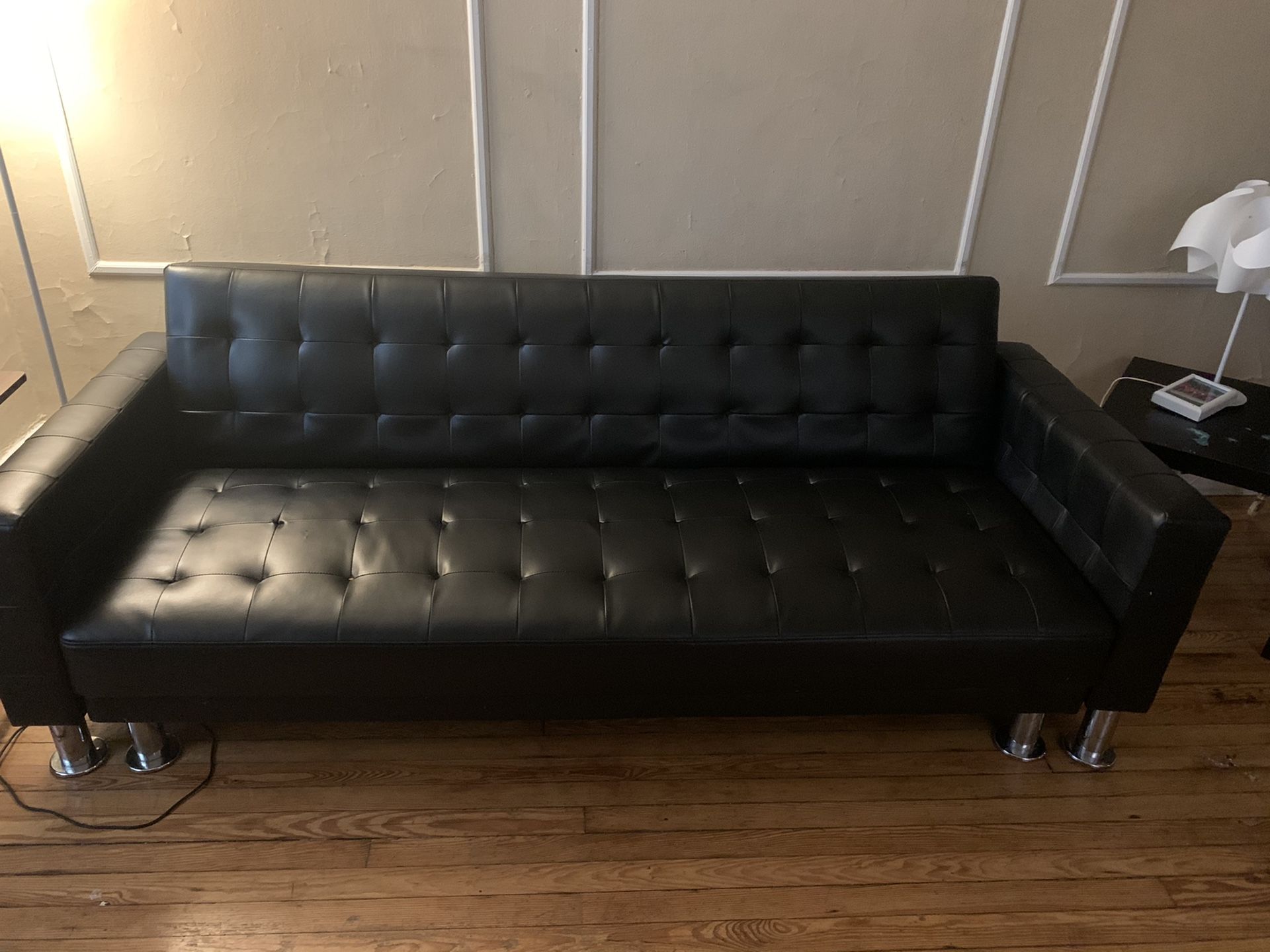 Way fair black vinyl couch