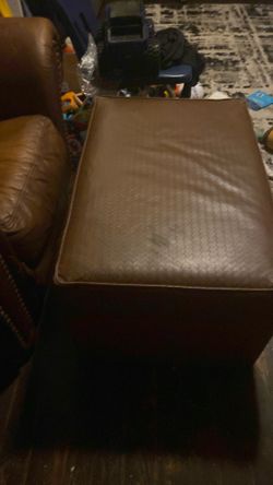 Leather chair with ottomon