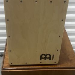 Meinl Percussion Jam Cajon drum. Used in good condition with some minor cosmetic blemishes. These blemishes are in the form of some scratches and scuf