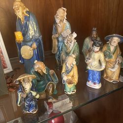 Small Asian male Statues