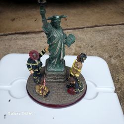 Firefighter standing around Statue Of Liberty Figurine 