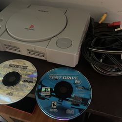 Play Station with Games & Cords  (Parts or repair)