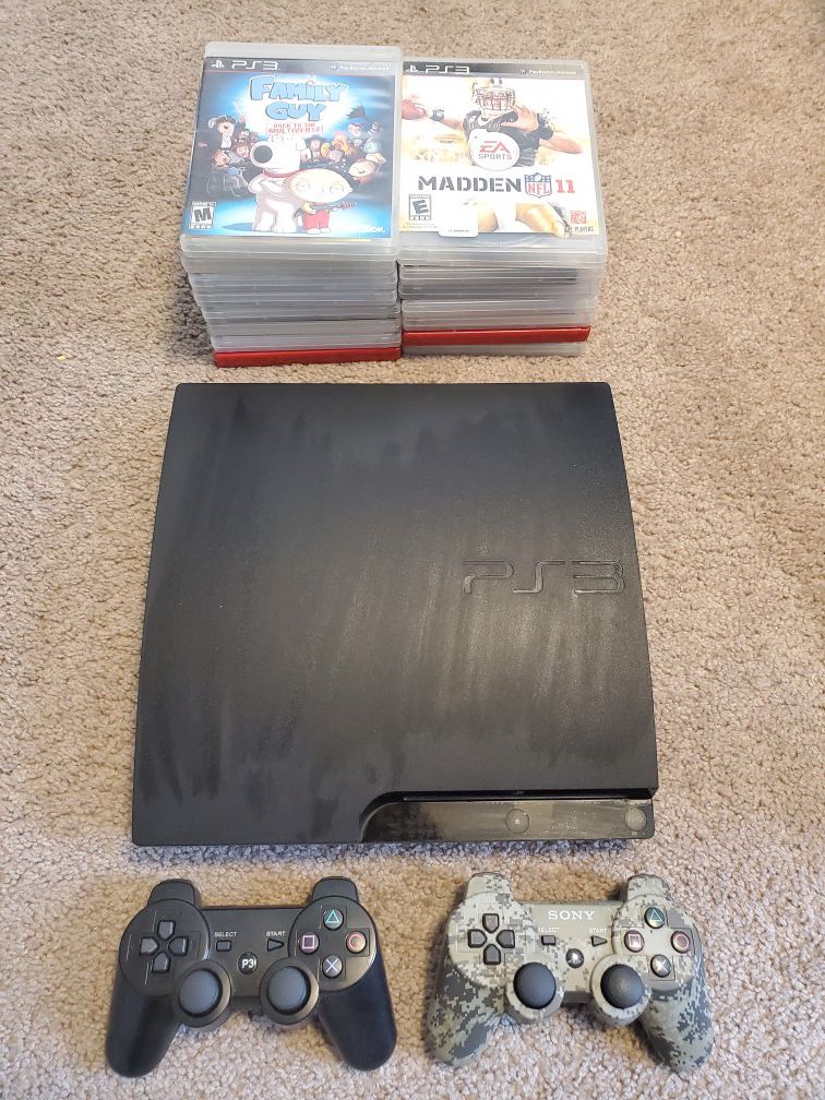 PS3 PlayStation 3 with 2 controller and lots of games
