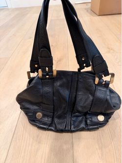 Michael Kors black leather handbag