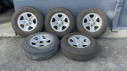 Five 16-inch steel jeep wheels with old tires 5 on 127mm 