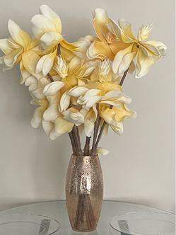 Flower base with fake flowers