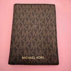 Micheal kors passport holder.