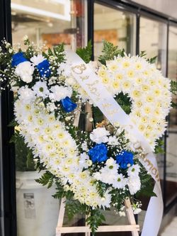 Funeral flowers , sympathy we delivered