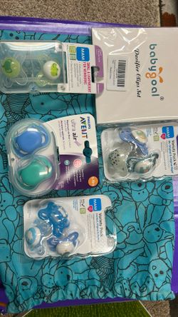 Pacifiers with pacifier clips