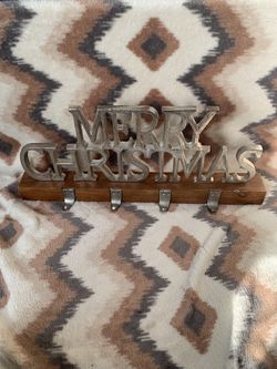 Merry Christmas stocking holder with a wooden stand