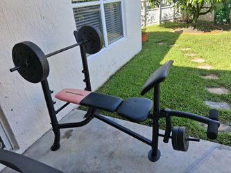 Weightlifting bench (weights included)