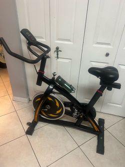 belt-driven indoor stationary spin bike